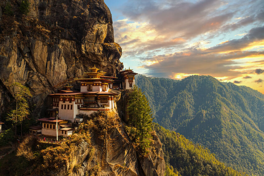 The Taktsang monastery on a precipitous cliff in the Paro Valley in the capital; one of Bhutan's popular tourism spots © coffe72 / amanaimages PLUS

